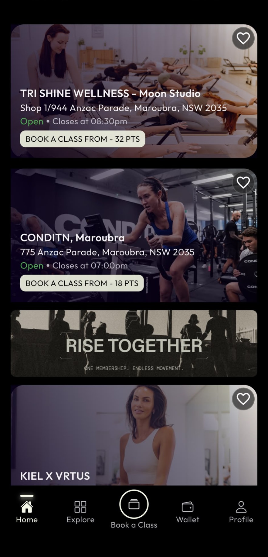 The Fitmate app showing nearby venues including TRI Shine Wellness, CONDITN and VRTUS, with class booking and the Fitmate navigation