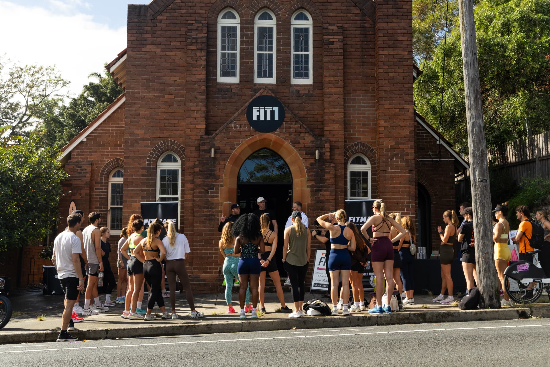 Crowd gathered outside the FIT1 studio entrance in Sydney